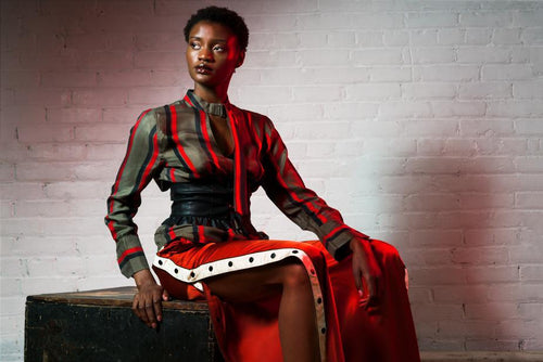 woman wearing black and red silk blouse